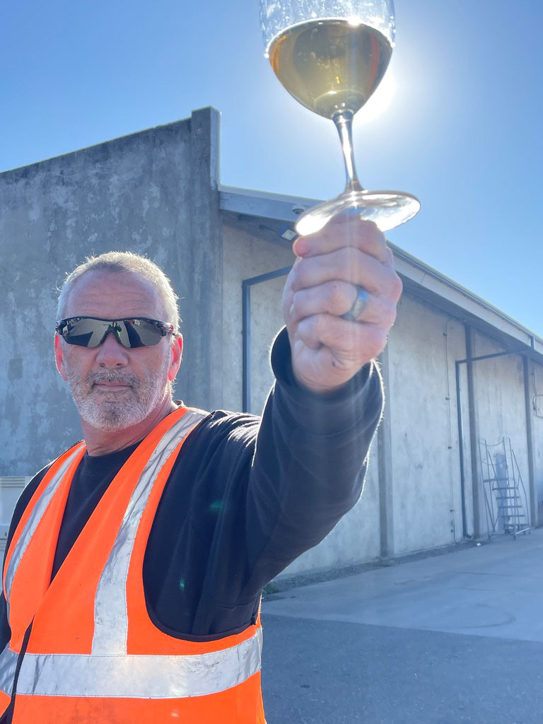 Steven Kent holding wine
